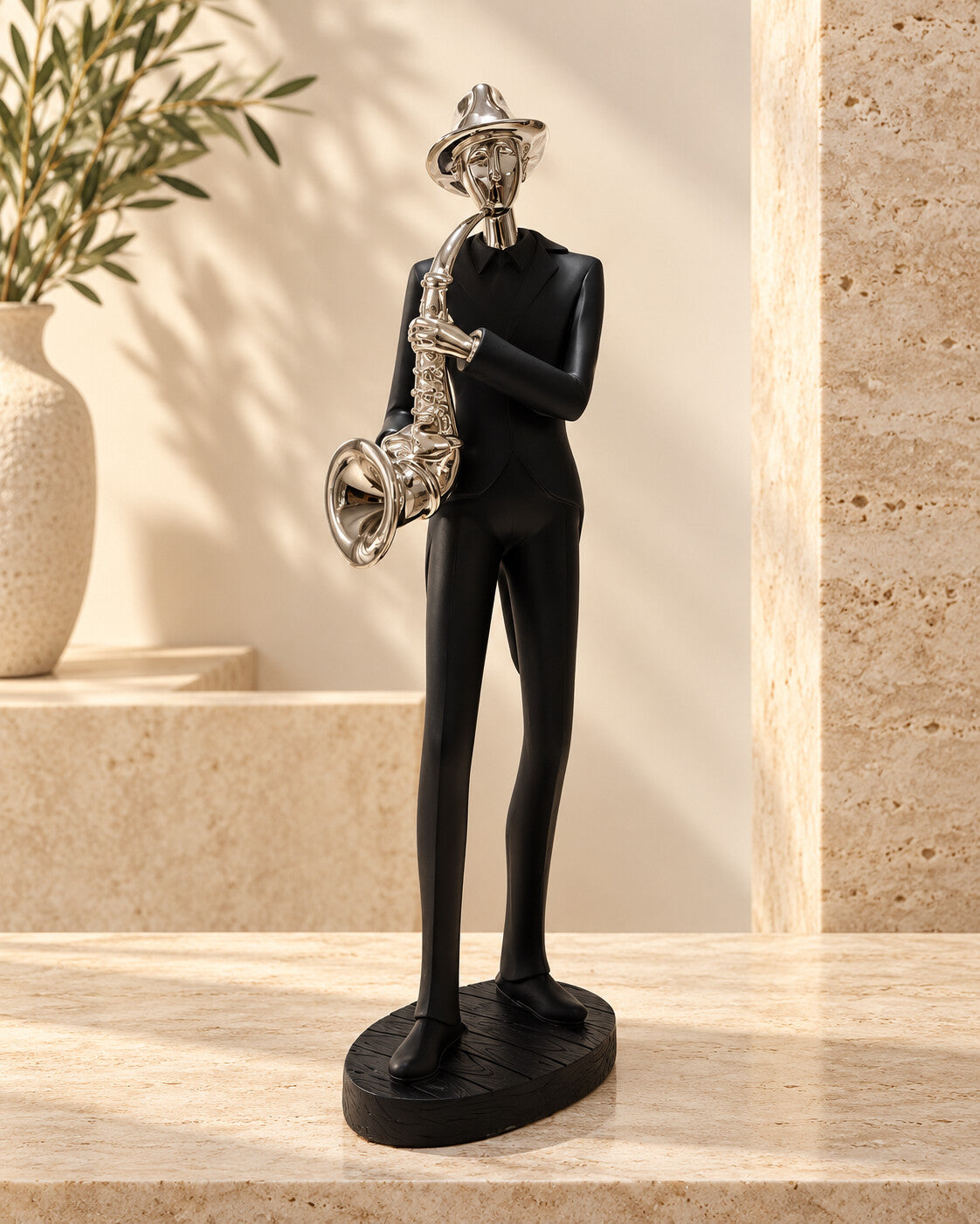 Sculpture saxophoniste noire et argentée | Atlas Maison