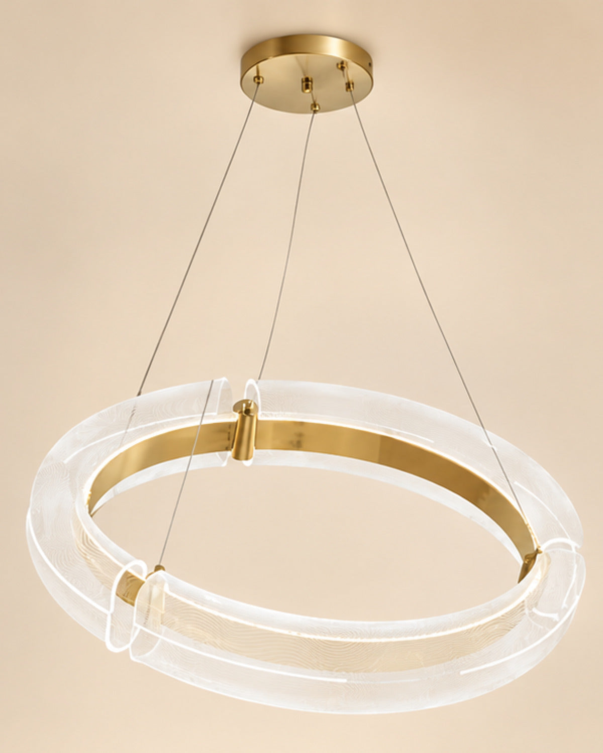 Suspension circulaire transparente dorée | Atlas Maison