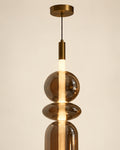 Suspension LED en verre fumé brun | Atlas Maison